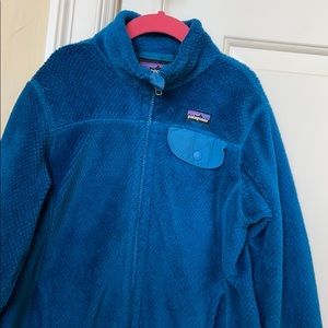 an adorable teal blue patagonia jacket🤩